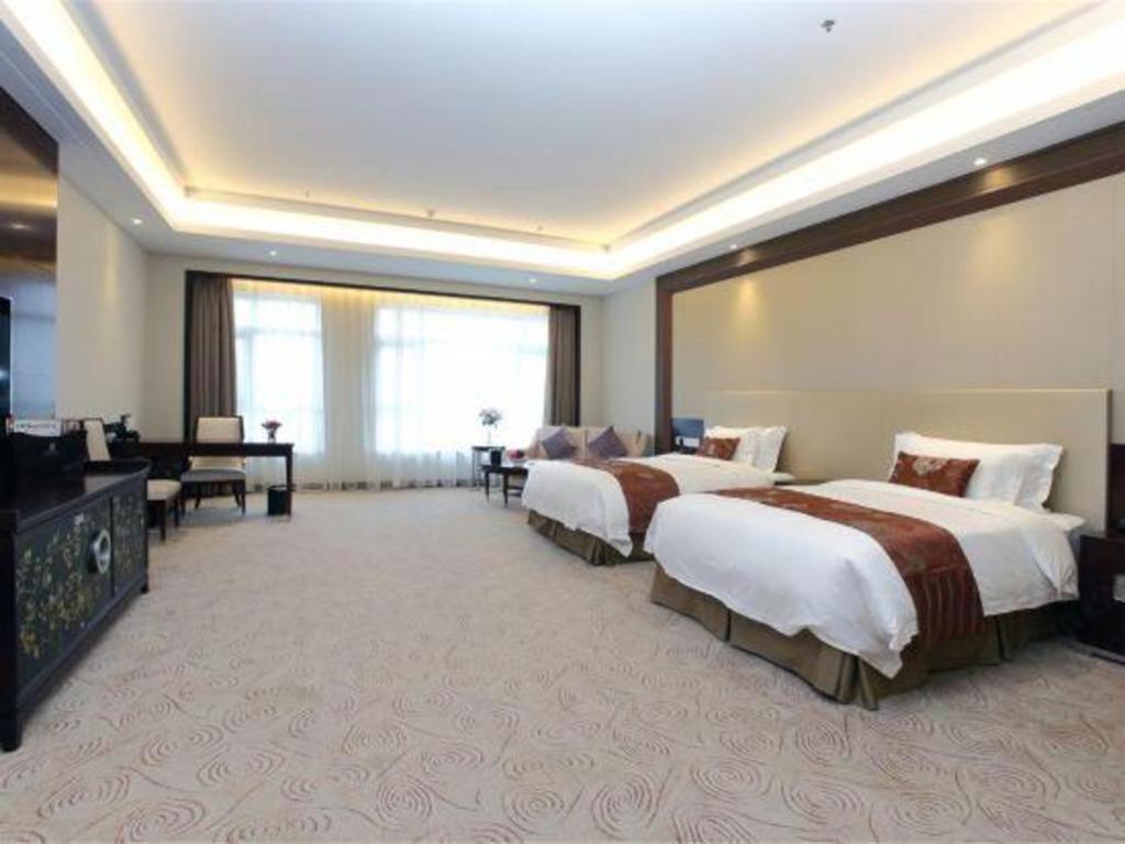 Linyi Blue Horizon International Hotel Yi He מראה חיצוני תמונה