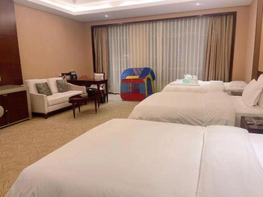 Linyi Blue Horizon International Hotel Yi He מראה חיצוני תמונה