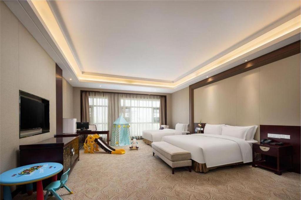 Linyi Blue Horizon International Hotel Yi He מראה חיצוני תמונה