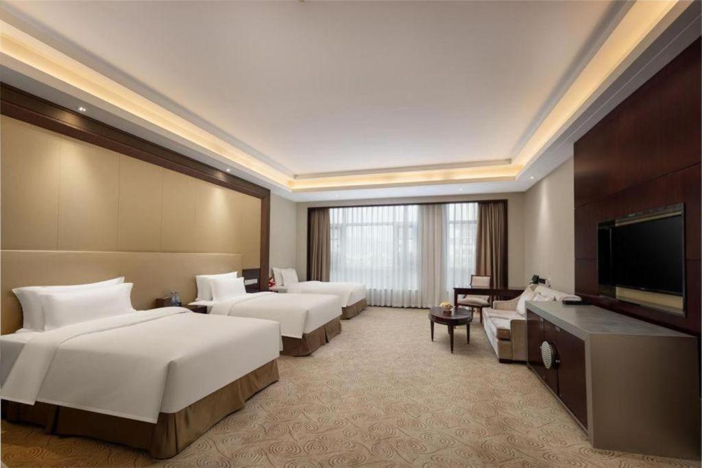 Linyi Blue Horizon International Hotel Yi He מראה חיצוני תמונה