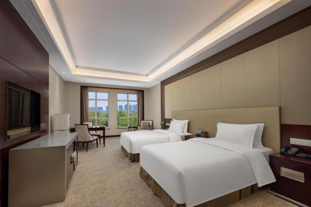 Linyi Blue Horizon International Hotel Yi He מראה חיצוני תמונה
