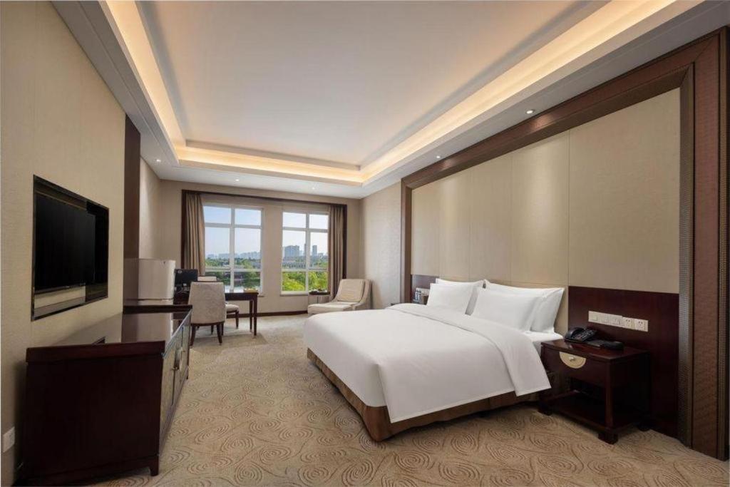 Linyi Blue Horizon International Hotel Yi He מראה חיצוני תמונה