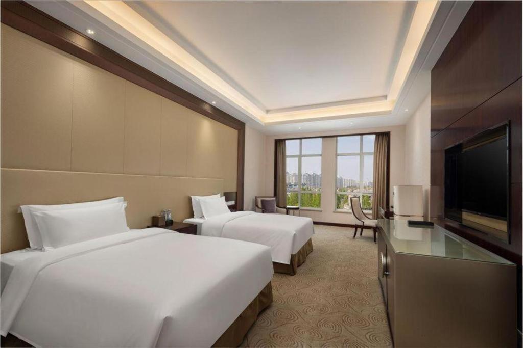 Linyi Blue Horizon International Hotel Yi He מראה חיצוני תמונה
